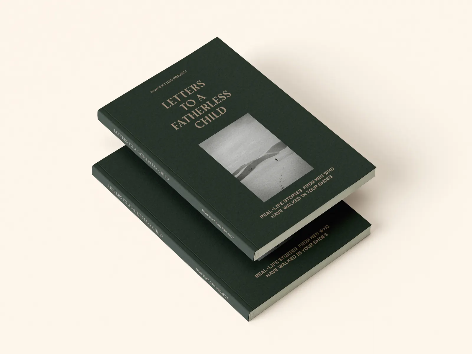 Two copies of Letters to a Fatherless Child, deep green paperbacks with a black and white photo on the cover