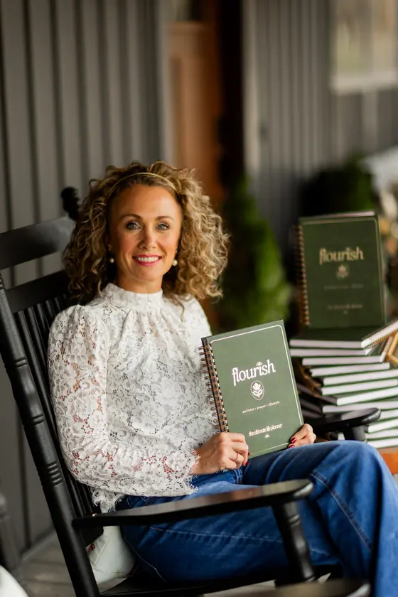 Michelle Johnson in a rocking chair with Flourish